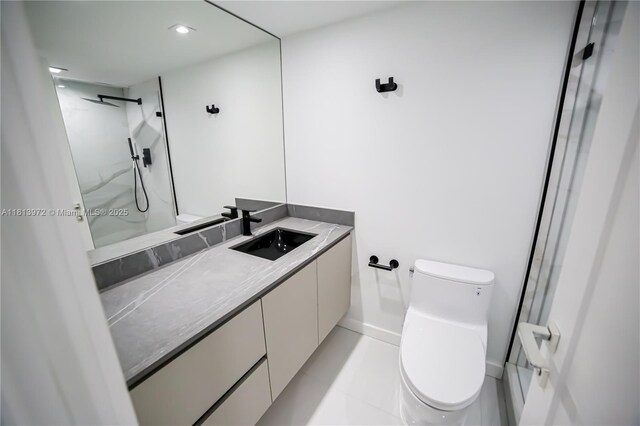 200 Leslie Dr Unit 314, Hallandale Beach, FL 33009 - bathroom featuring toilet, vanity, a walk in shower, tile patterned flooring, and baseboards