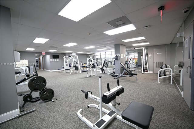 200 Leslie Dr Unit 314, Hallandale Beach, FL 33009 - workout area with a paneled ceiling and baseboards