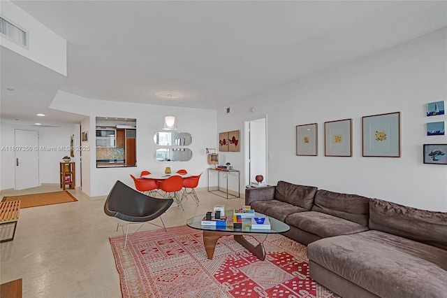 400 Alton Rd Unit 1409, Miami Beach, FL 33139 - living room featuring concrete flooring