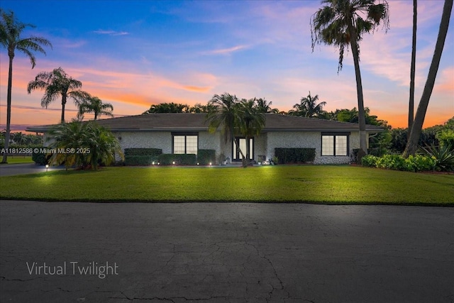 3030 SW 117th Ave, Davie, FL 33330 - mid-century inspired home with a lawn and stucco siding