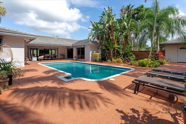 3030 SW 117th Ave, Davie, FL 33330 - view of swimming pool featuring a patio