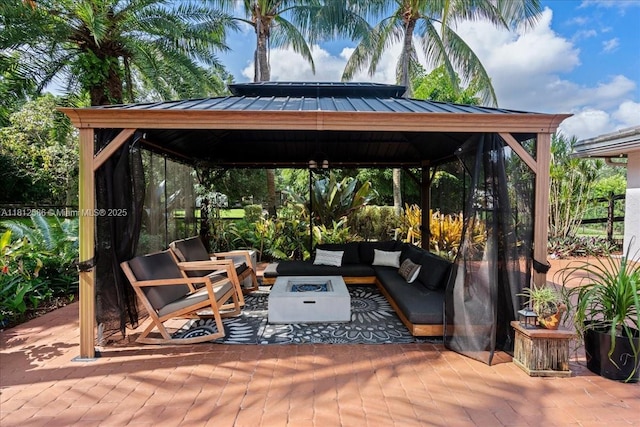 3030 SW 117th Ave, Davie, FL 33330 - view of patio featuring a gazebo, a wooden deck, and an outdoor living space with a fire pit