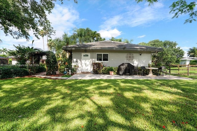 3030 SW 117th Ave, Davie, FL 33330 - back of house with stucco siding and a patio area