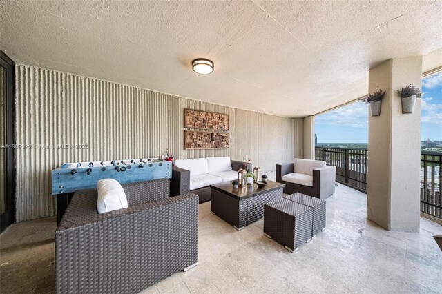 2901 S Bayshore Dr Unit 17G/H, Miami, FL 33133 - view of patio with an outdoor living space and a balcony