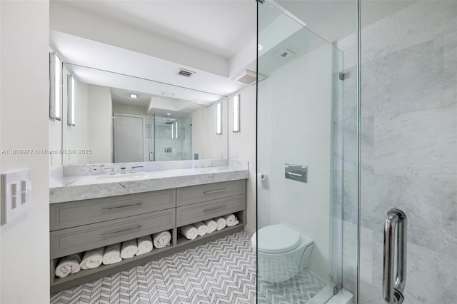 2901 S Bayshore Dr Unit 17G/H, Miami, FL 33133 - full bathroom with vanity, a shower stall, and toilet