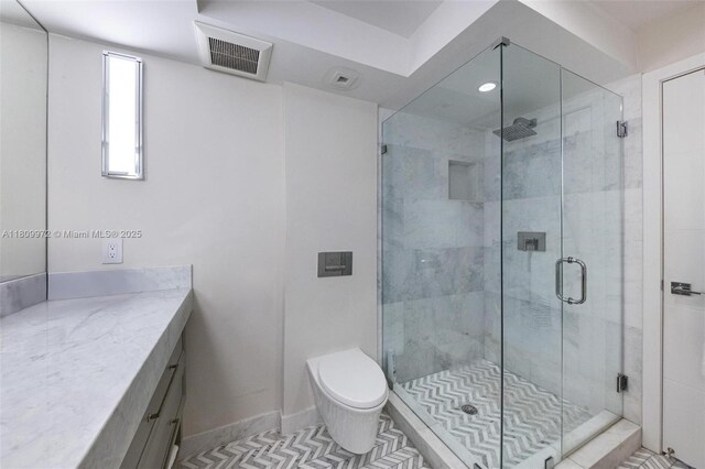 2901 S Bayshore Dr Unit 17G/H, Miami, FL 33133 - full bath featuring vanity, a shower stall, toilet, and recessed lighting
