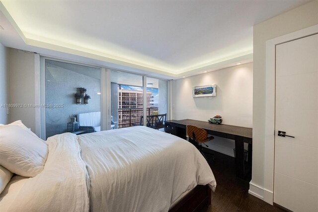 2901 S Bayshore Dr Unit 17G/H, Miami, FL 33133 - bedroom with a raised ceiling, dark wood finished floors, and baseboards