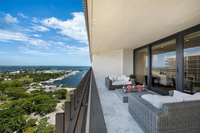 2901 S Bayshore Dr Unit 17G/H, Miami, FL 33133 - balcony with a water view and an outdoor hangout area