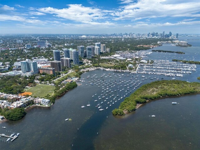 2901 S Bayshore Dr Unit 17G/H, Miami, FL 33133 - aerial view of skyline, a nearby body of water, and a marina