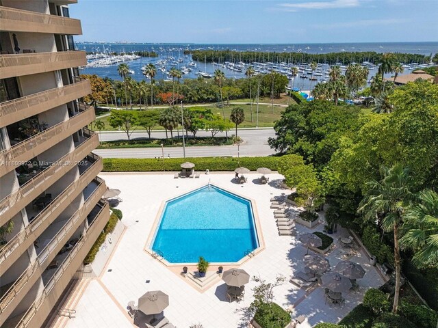 2901 S Bayshore Dr Unit 17G/H, Miami, FL 33133 - aerial view of a large body of water, numerous boat docks, and a pool