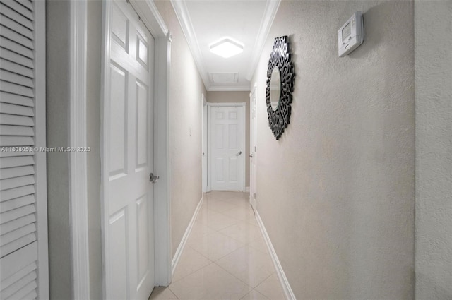 3200 W 7th Ave, Hialeah, FL 33012 - hallway with ornamental molding, light tile patterned floors, and baseboards