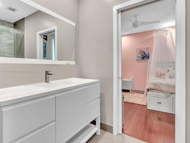 7448 SW 120th Ct, Miami, FL 33183 - ensuite bathroom with vanity, a ceiling fan, baseboards, an enclosed shower, and wood finished floors