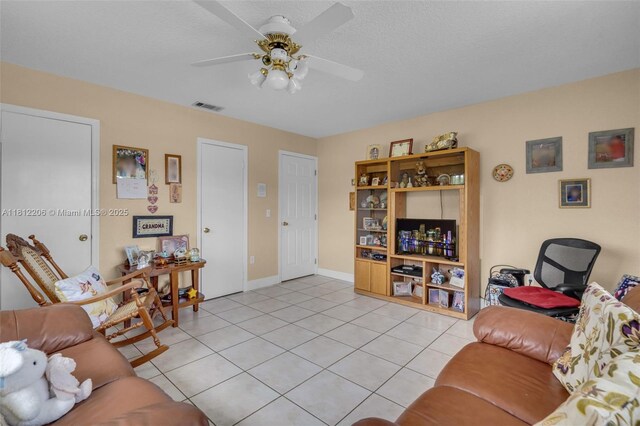 17550 SW 59th Ct, Southwest Ranches, FL 33331 - living area featuring light tile patterned floors and a ceiling fan