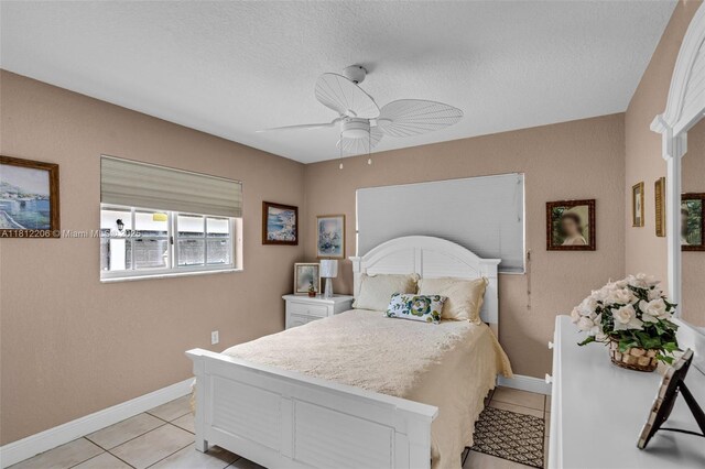 17550 SW 59th Ct, Southwest Ranches, FL 33331 - bedroom featuring light tile patterned flooring, ceiling fan, and a textured ceiling