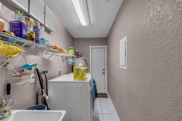 17550 SW 59th Ct, Southwest Ranches, FL 33331 - washroom featuring a textured wall, light tile patterned floors, electric water heater, washing machine and dryer, and electric panel