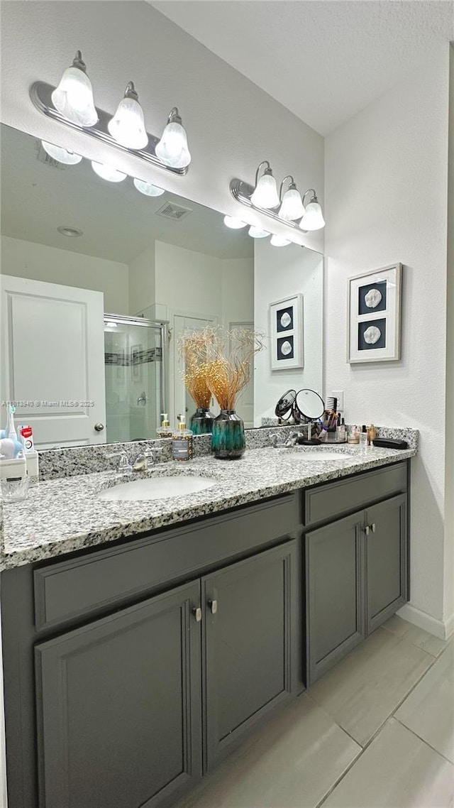 486 Disa Dr, Davenport, FL 33837 - bathroom with double vanity and a shower stall