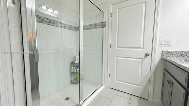 486 Disa Dr, Davenport, FL 33837 - bathroom with vanity, a stall shower, and tile patterned flooring