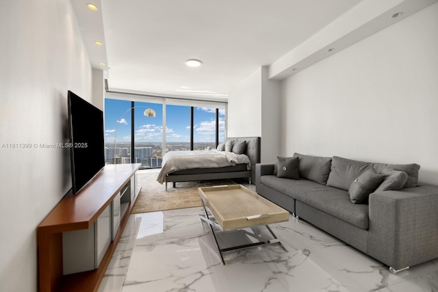 18555 Collins Ave Unit 4603, Sunny Isles Beach, FL 33160 - living area with a wall of windows, recessed lighting, and light marble finish floors