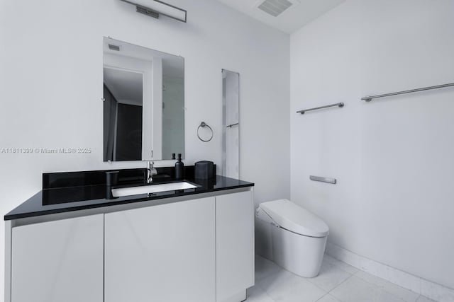 18555 Collins Ave Unit 4603, Sunny Isles Beach, FL 33160 - bathroom with vanity and tile patterned flooring