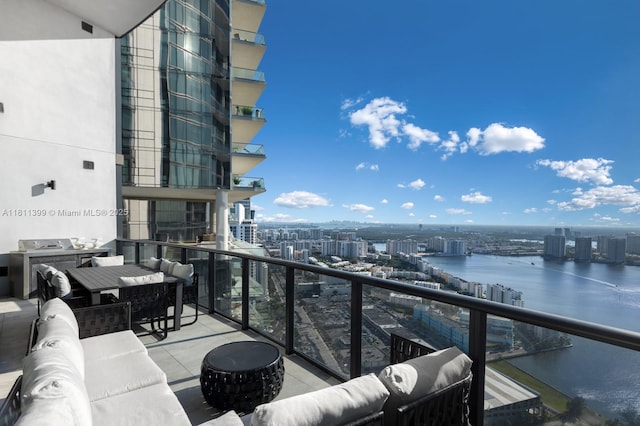 18555 Collins Ave Unit 4603, Sunny Isles Beach, FL 33160 - balcony with a view of city, outdoor lounge area, and a water view