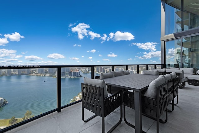18555 Collins Ave Unit 4603, Sunny Isles Beach, FL 33160 - balcony featuring an outdoor living space and a water view