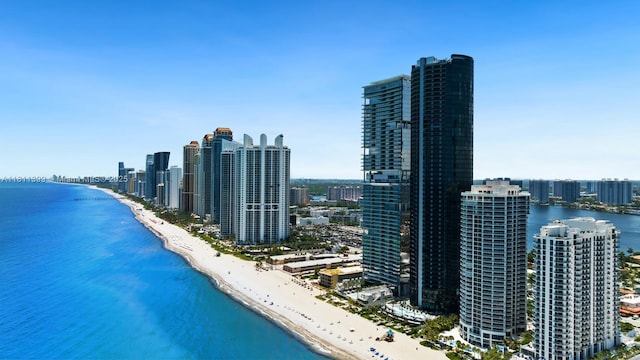 18555 Collins Ave Unit 4603, Sunny Isles Beach, FL 33160 - drone / aerial view of waterfront with a beach and skyline