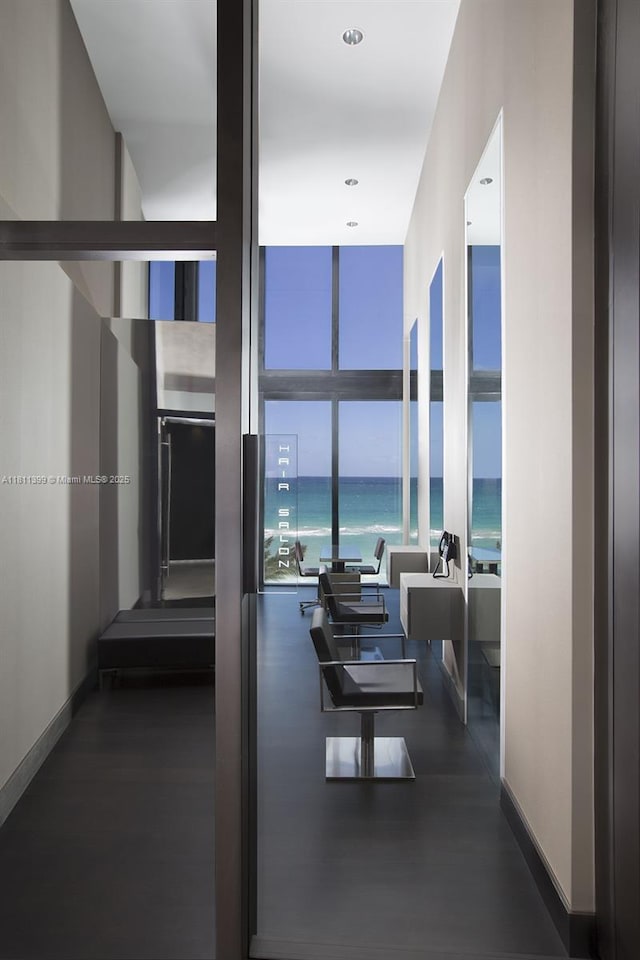 18555 Collins Ave Unit 4603, Sunny Isles Beach, FL 33160 - hall with expansive windows, a water view, and recessed lighting