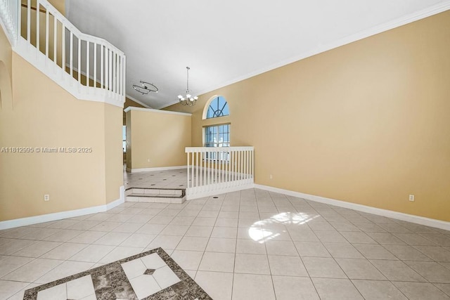 2434 SW 157th Ave, Miramar, FL 33027 - unfurnished room featuring ornamental molding, tile patterned floors, a chandelier, baseboards, and vaulted ceiling