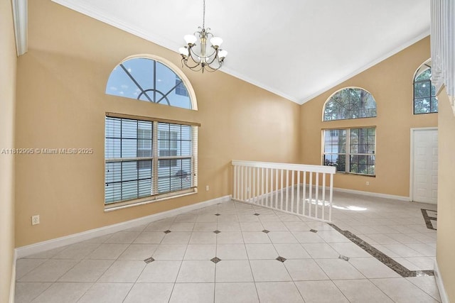 2434 SW 157th Ave, Miramar, FL 33027 - foyer entrance with a chandelier, healthy amount of natural light, crown molding, high vaulted ceiling, and baseboards