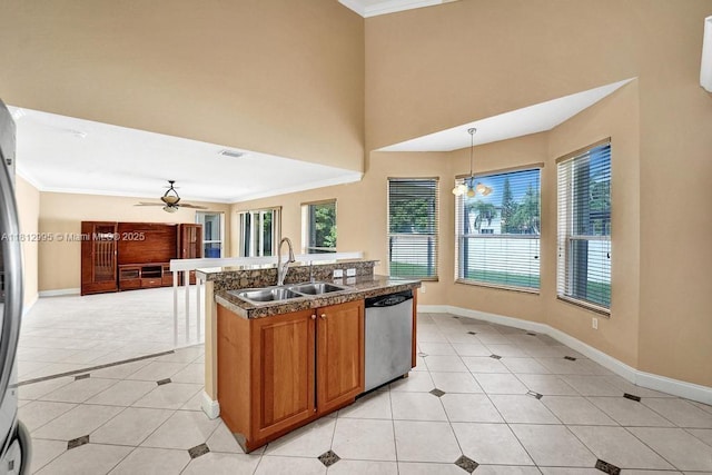 2434 SW 157th Ave, Miramar, FL 33027 - kitchen featuring dishwasher, a sink, light tile patterned flooring, a ceiling fan, and crown molding