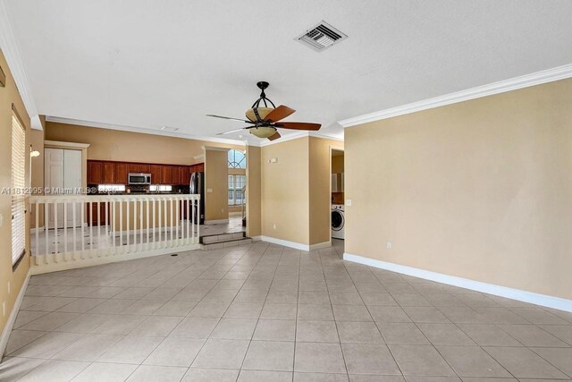 2434 SW 157th Ave, Miramar, FL 33027 - unfurnished living room with a ceiling fan, crown molding, light tile patterned flooring, and baseboards