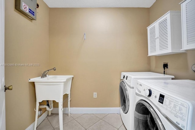 2434 SW 157th Ave, Miramar, FL 33027 - washroom with washing machine and dryer, light tile patterned floors, and baseboards