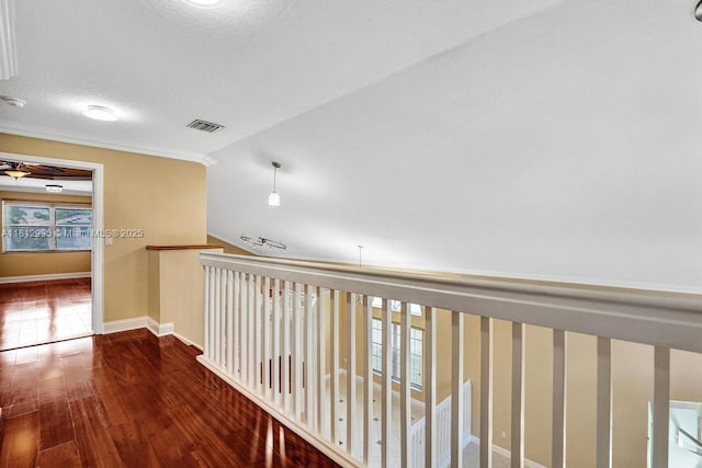 2434 SW 157th Ave, Miramar, FL 33027 - hallway featuring hardwood / wood-style flooring, baseboards, a textured ceiling, and lofted ceiling