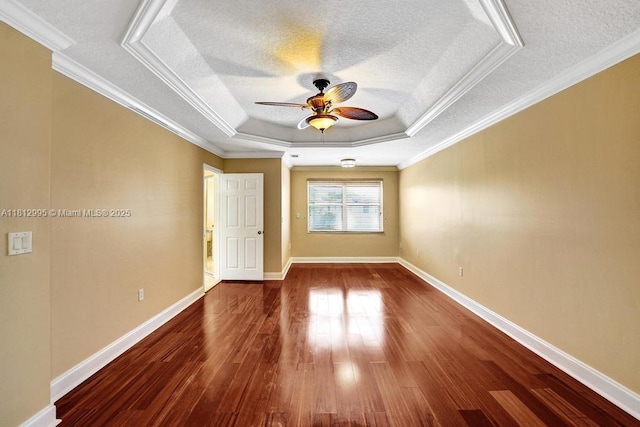 2434 SW 157th Ave, Miramar, FL 33027 - empty room with a tray ceiling, ceiling fan, wood finished floors, a textured ceiling, and baseboards