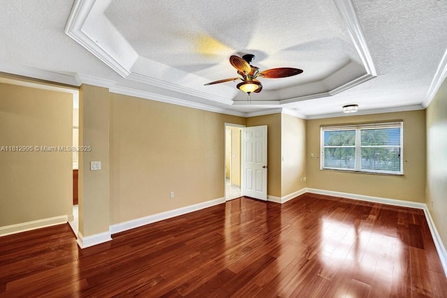 2434 SW 157th Ave, Miramar, FL 33027 - unfurnished room featuring a raised ceiling, a ceiling fan, a textured ceiling, wood finished floors, and baseboards