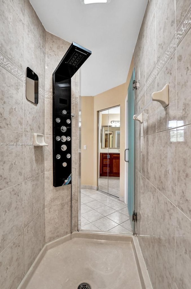 2434 SW 157th Ave, Miramar, FL 33027 - bathroom featuring a tile shower, tile patterned floors, and vanity