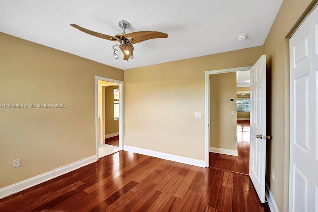 2434 SW 157th Ave, Miramar, FL 33027 - spare room featuring a ceiling fan, wood finished floors, baseboards, and a smoke detector