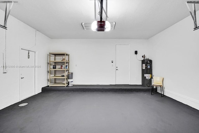 2434 SW 157th Ave, Miramar, FL 33027 - garage featuring a garage door opener and electric water heater
