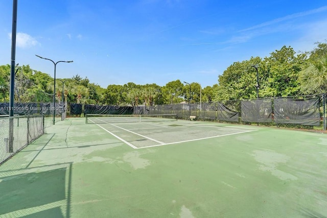 2434 SW 157th Ave, Miramar, FL 33027 - view of tennis court with view of scattered trees