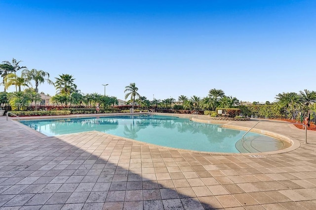 2434 SW 157th Ave, Miramar, FL 33027 - community pool featuring a patio area