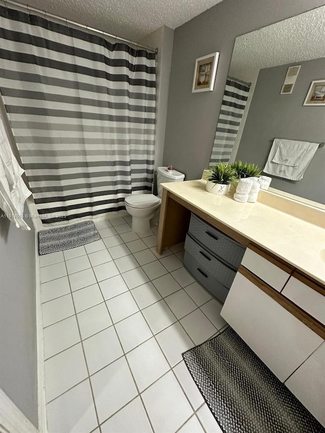 3995 W Mcnab Rd Unit B212, Pompano Beach, FL 33069 - full bath featuring a textured ceiling, toilet, vanity, tile patterned flooring, and a shower with curtain