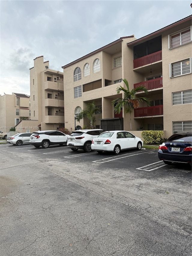 10661 SW 108th Ave Unit 2E, Miami, FL 33176 - view of property featuring uncovered parking