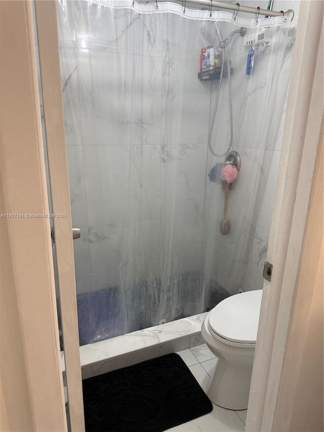 10661 SW 108th Ave Unit 2E, Miami, FL 33176 - full bathroom featuring a marble finish shower and toilet