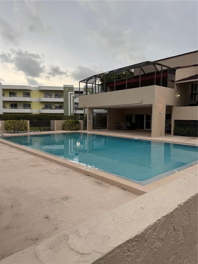 10661 SW 108th Ave Unit 2E, Miami, FL 33176 - community pool with a patio area