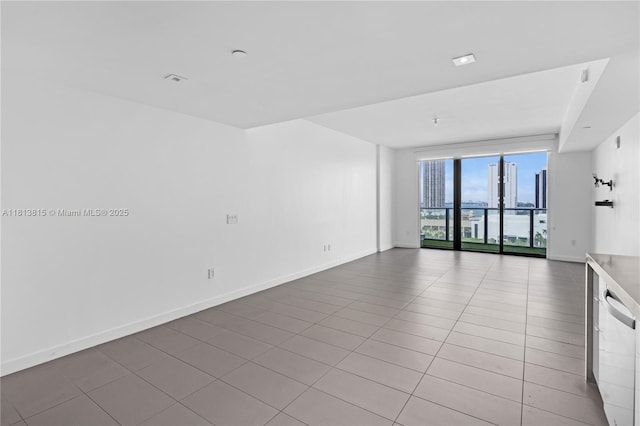 1600 NE 1st Ave Unit 1402, Miami, FL 33132 - empty room featuring tile patterned flooring and baseboards