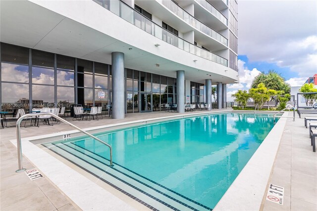 1600 NE 1st Ave Unit 1402, Miami, FL 33132 - community pool featuring a patio