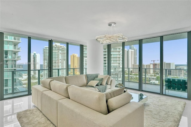 330 Sunny Isles Blvd Unit 5-1808, Sunny Isles Beach, FL 33160 - living room featuring a view of skyline, a wall of windows, and a chandelier