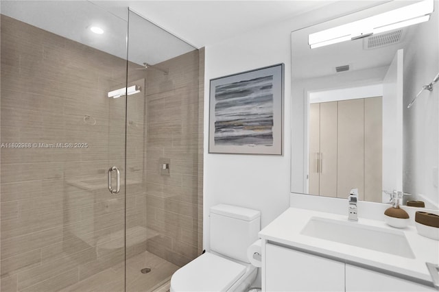 330 Sunny Isles Blvd Unit 5-1808, Sunny Isles Beach, FL 33160 - bathroom with toilet, vanity, a stall shower, and recessed lighting