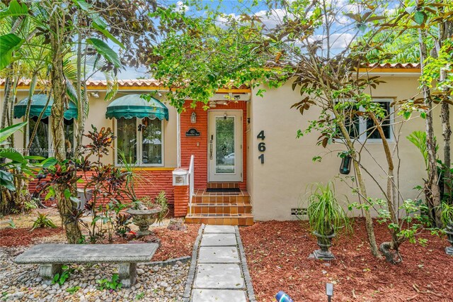 461 Morningside Dr, Miami Springs, FL 33166 - property entrance with stucco siding