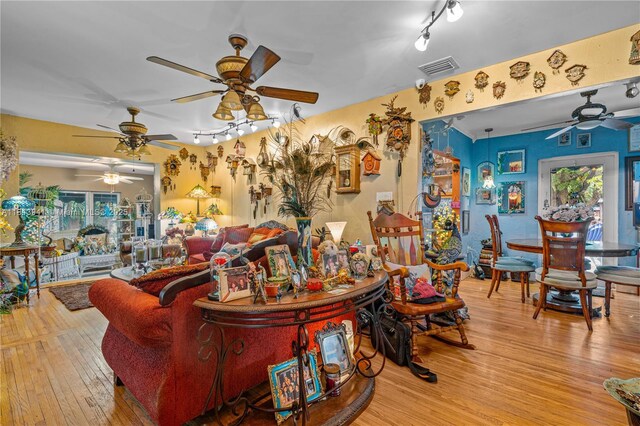 461 Morningside Dr, Miami Springs, FL 33166 - living area with ceiling fan, hardwood / wood-style flooring, and track lighting